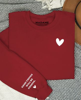 Corazón y nombres en las mangas